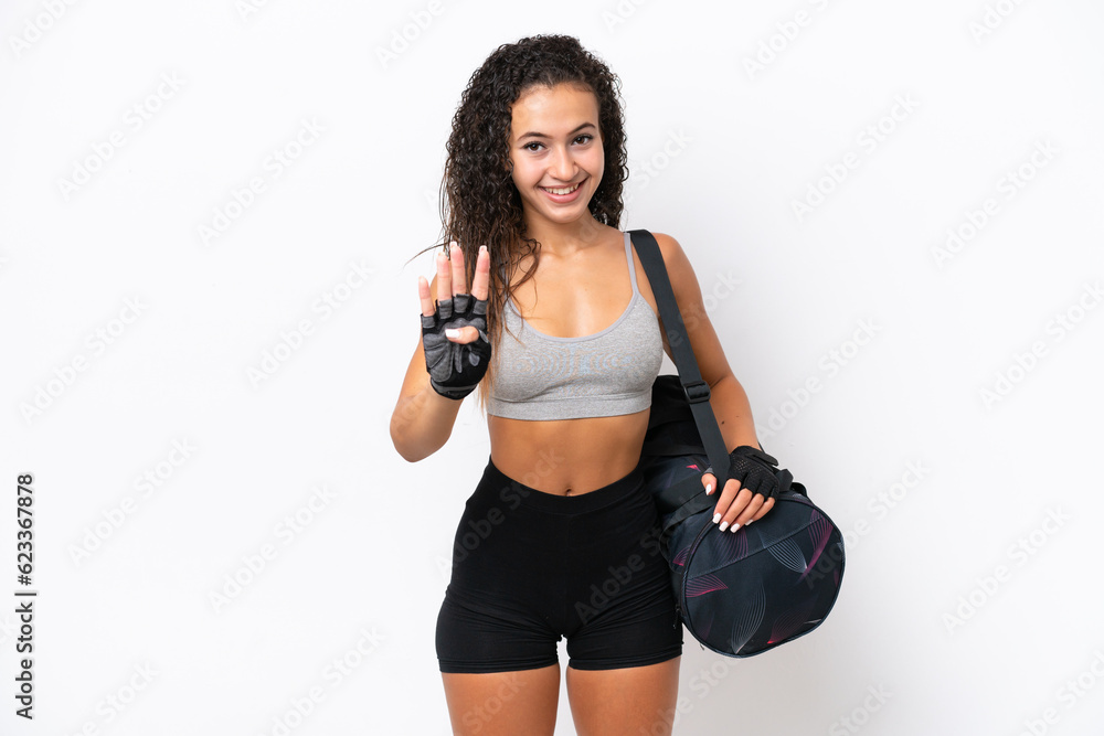 Young sport Arab woman with sport bag isolated on white background happy and counting four with fingers Young sport Arab woman with sport bag isolated on white background happy and counting four with fingers