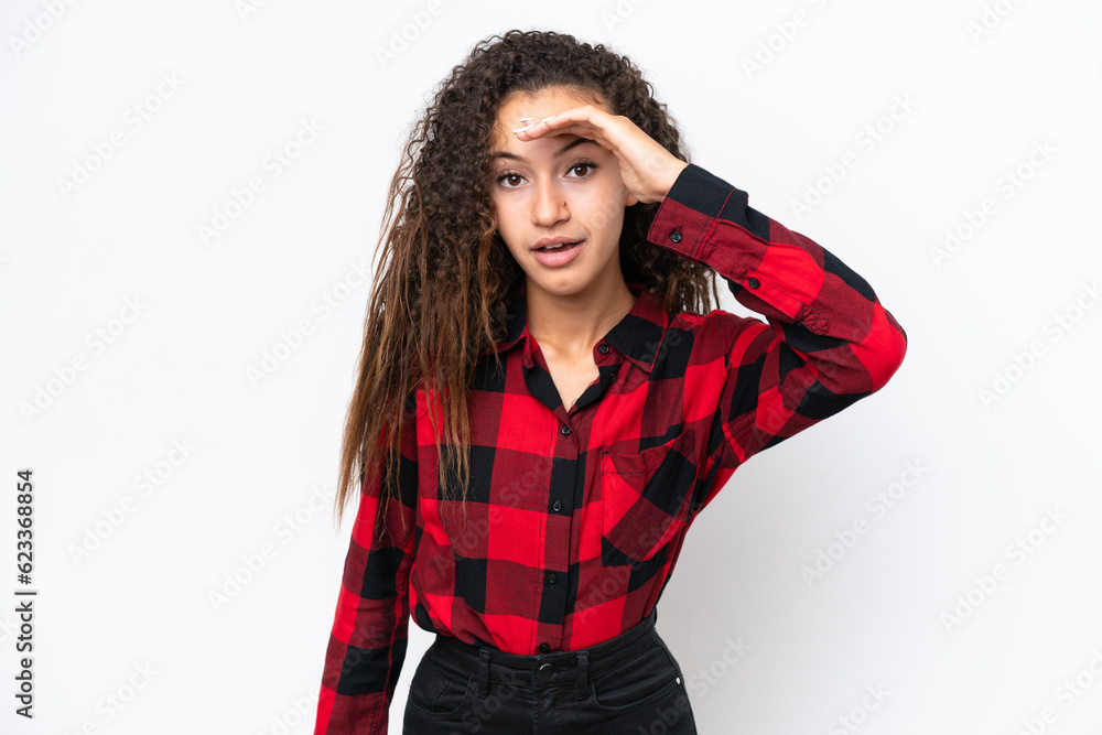 Young Arab woman isolated on white background looking far away with hand to look something Young Arab woman isolated on white background looking far away with hand to look something
