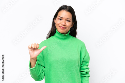 Young Colombian woman isolated on white background proud and self-satisfied