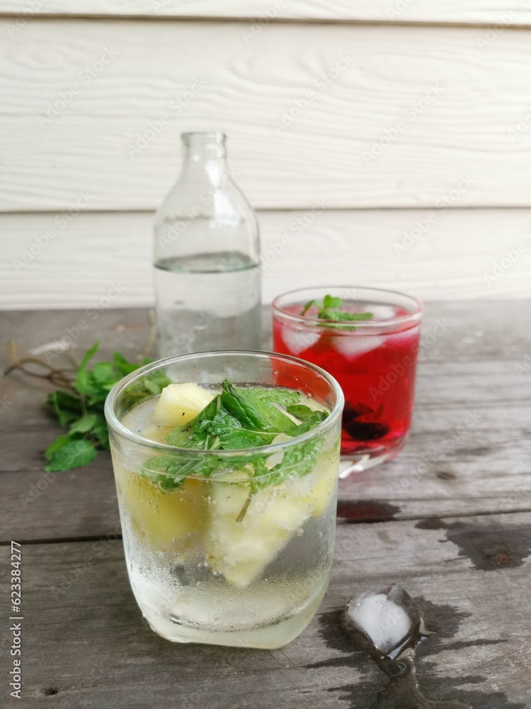 Fototapeta premium Summer soft drink pineapple and fruit mix berry