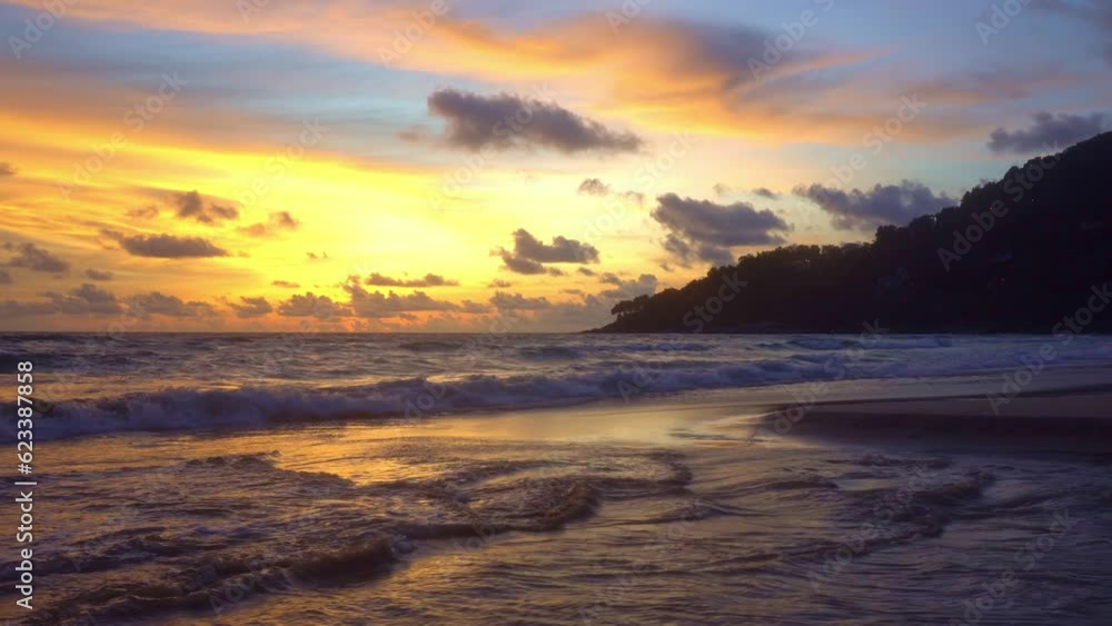 .calm sea with sunset sky and sun through the clouds over..Meditation ocean and sky background. Tranquil seascape..Reflection of yellow sky on the surface by the beach in golden sunset. .calm sea with sunset sky and sun through the clouds over..Meditation ocean and sky background. Tranquil seascape..Reflection of yellow sky on the surface by the beach in golden sunset.