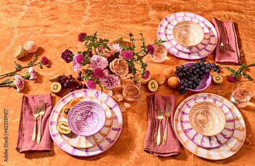 food, table, plate, decoration, celebration, fruit, flower, gourmet, napkin, roses, gold, multi colored, orange, purple, Spanish, pattern, hand painted  photo