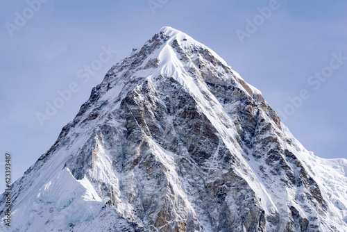 Pumori (or Pumo Ri) is a mountain in the Mahalangur section of the Himalayas.Pumori lies just eight kilometres west of Mount Everest.Pumori's meaning 
