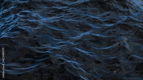 Slow motion close up of disturbed blue dark ocean water waves surface