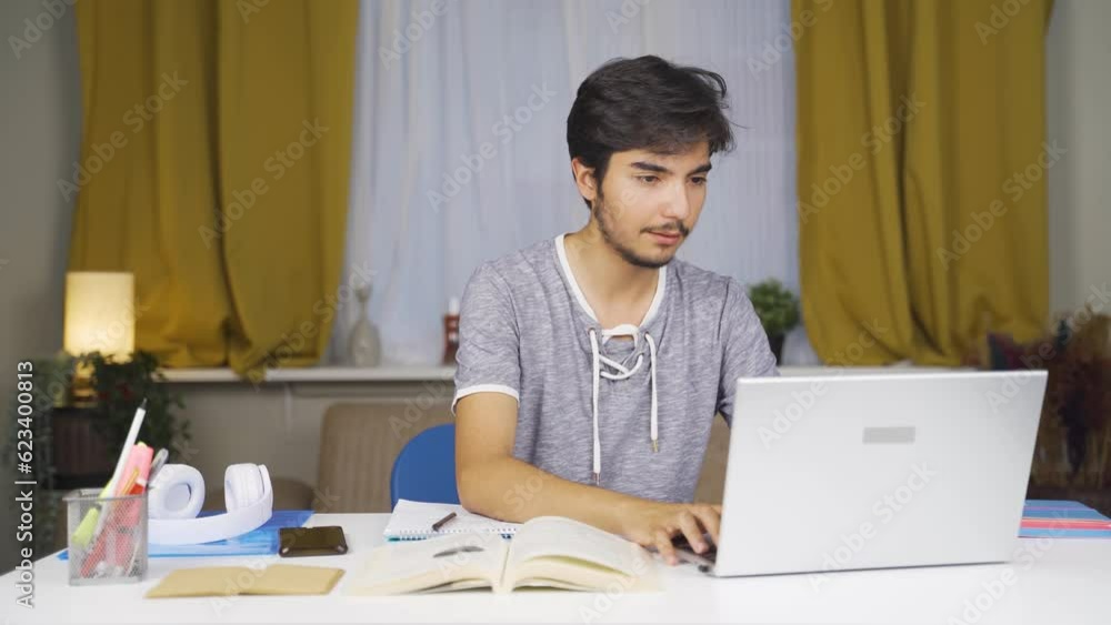 The successful male student is happy and full of joy. The successful male student is happy and full of joy.