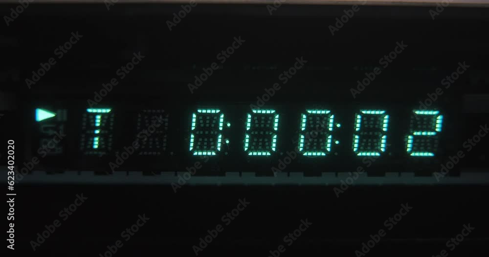 LCD display close-up, playing a disc from a DVD player LCD display close-up, playing a disc from a DVD player