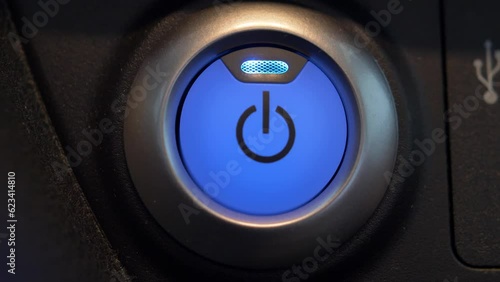 Pressing Stand By Power Button To Turn On and Off the Electric Car Close-Up