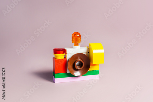 blocks camera made of building blocks, isolated on white. Concept of work, photography, photographer, photo, picture, dslr, compact camera, mirrorless.