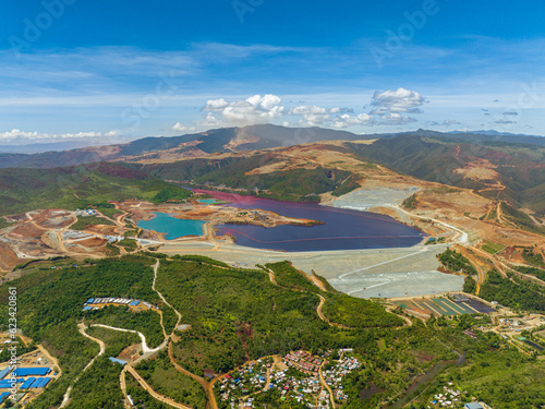 Nickel mining with forest in surroundings and villlages. Environtmental resources. Mindanao, Philippines. photo