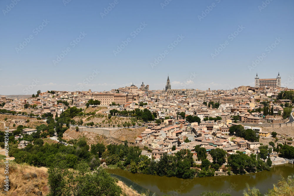 Scenic view of the river and old town of Toledo, Spain on a sunny day