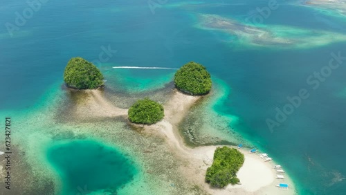 Birds eye view of Jetski roaming around Britania Island. Mindanao, Philippines. photo