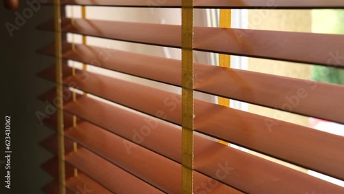 Open and close wooden blinds. Blind control