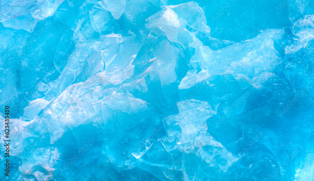 A close-up of the layered surface of a blue glacier (iceberg) - Knud Rasmussen Glacier near Kulusuk - Greenland, East Greenland