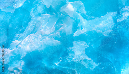 Fotografia, Obraz A close-up of the layered surface of a blue glacier (iceberg) - Knud Rasmussen G