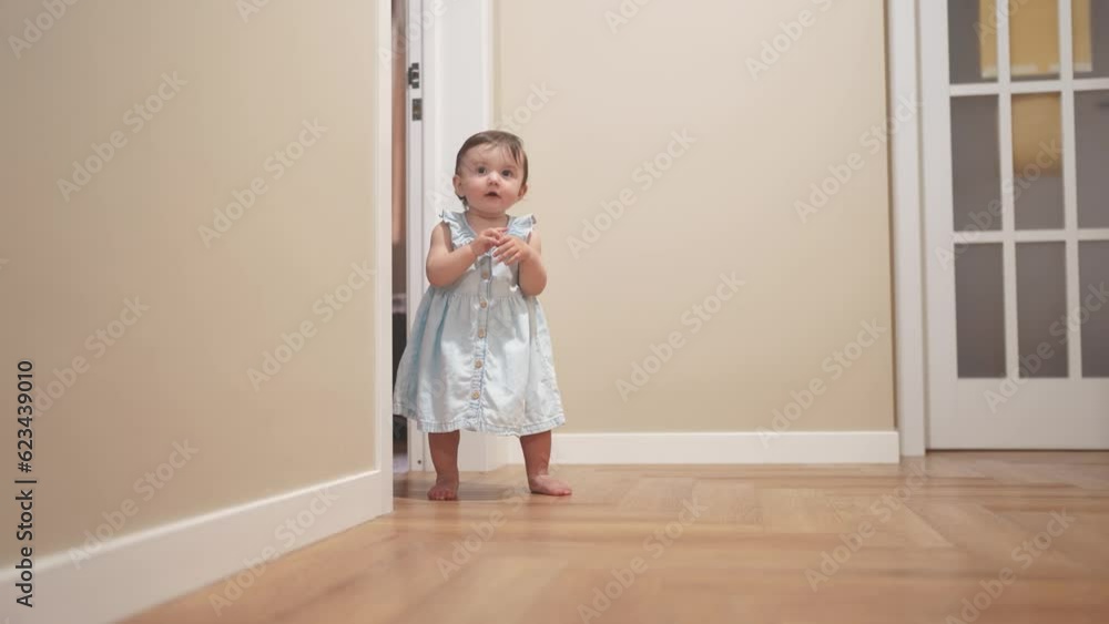 baby first steps. daughter a baby toddler learning to walk take first steps. happy family kid dream lifestyle concept. baby indoors learning to walk indoors. baby training concept baby first steps. daughter a baby toddler learning to walk take first steps. happy family kid dream lifestyle concept. baby indoors learning to walk indoors. baby training concept