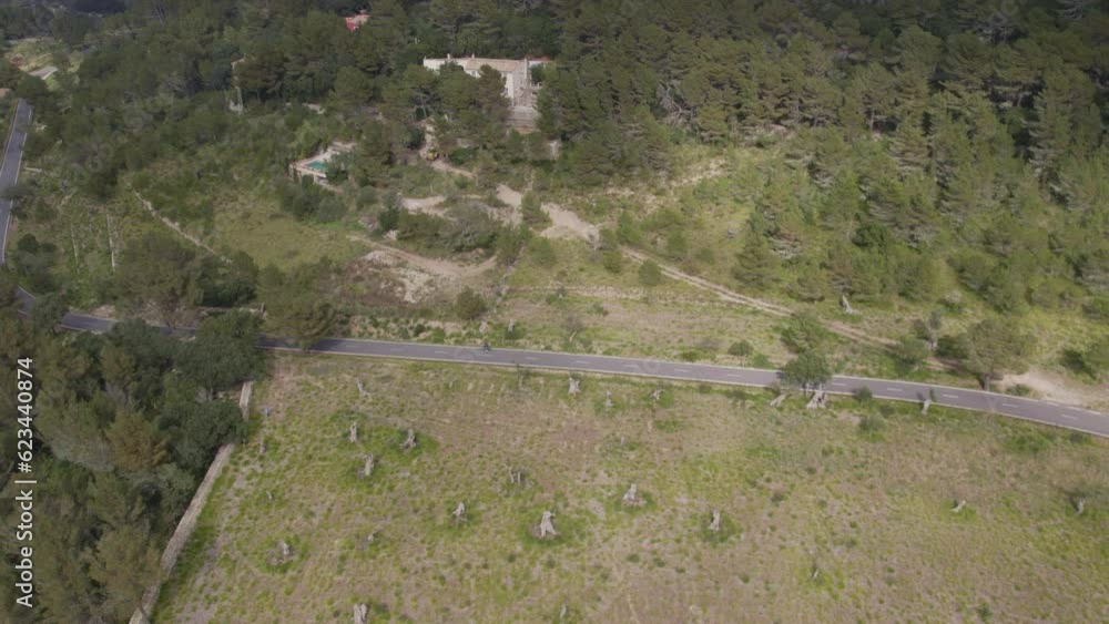Aerial view of small mountain road at Mallorca island during day time Aerial view of small mountain road at Mallorca island during day time