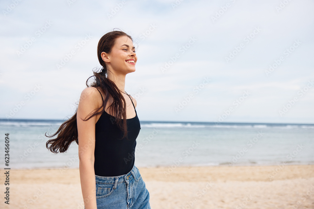 woman carefree sunset beach running summer lifestyle sea young travel smile woman carefree sunset beach running summer lifestyle sea young travel smile