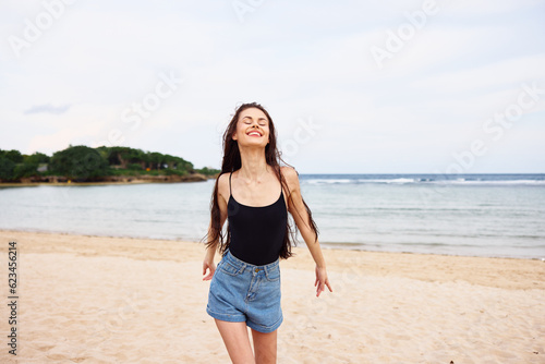 woman summer beauty beach sea running smile sunset young lifestyle travel