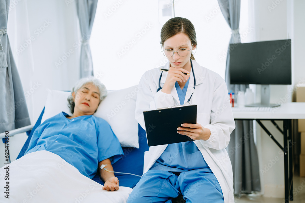 Obraz premium Woman Doctor and patient discussing something while sitting on examination bed in modern clinic or hospital . Medicine and health care concept.