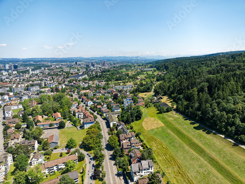 Aerial view of City of Zürich district Schwamendingen on a sunny summer day. Photo taken June 24th, 2023, Zurich, Switzerland. photo