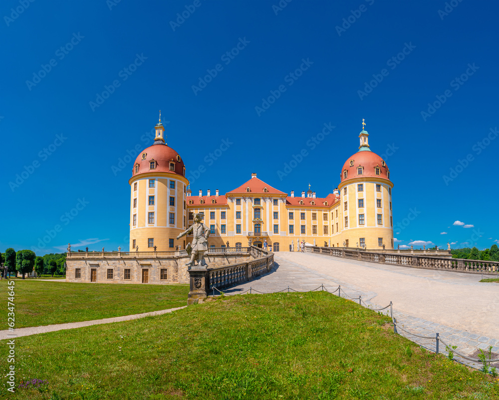 Moritzburg, Saxony, Germany - July 7, 2023: Famous ancient Moritzburg Castle, near Dresden at sunny summer day with blue sky