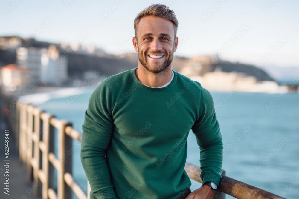 Close-up portrait photography of a happy boy in his 30s wearing soft sweatpants against a picturesque harbor background. With generative AI technology Close-up portrait photography of a happy boy in his 30s wearing soft sweatpants against a picturesque harbor background. With generative AI technology