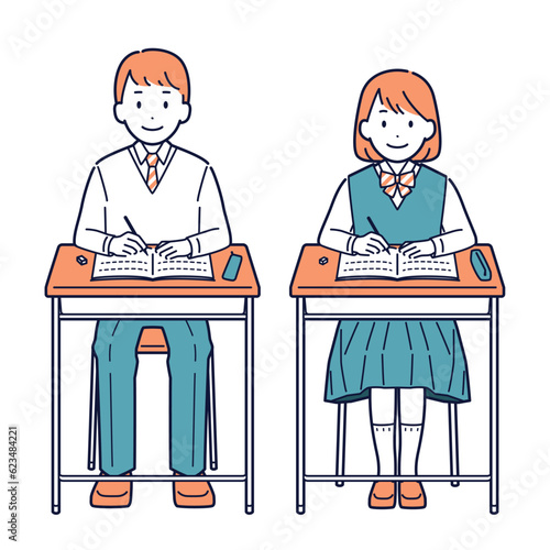 机で勉強する学生の男女＿全身