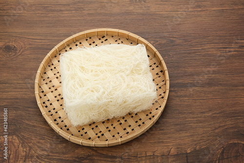 Vermicelli or Dry Glass Noodles served on wooden plate 
