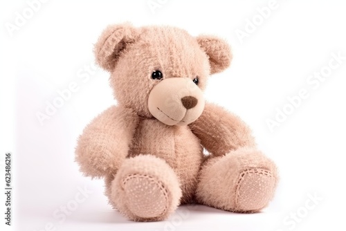 Fluffy brown teddy bear on a white background. © Iryna