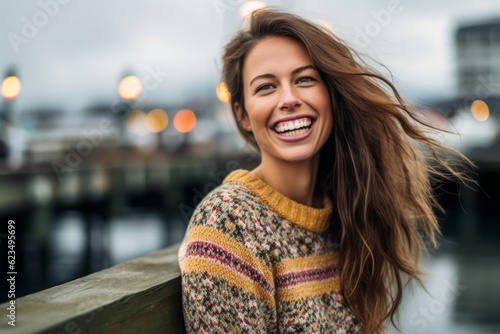 Close-up portrait photography of a joyful girl in her 30s wearing a cozy sweater against a busy marina background. With generative AI technology