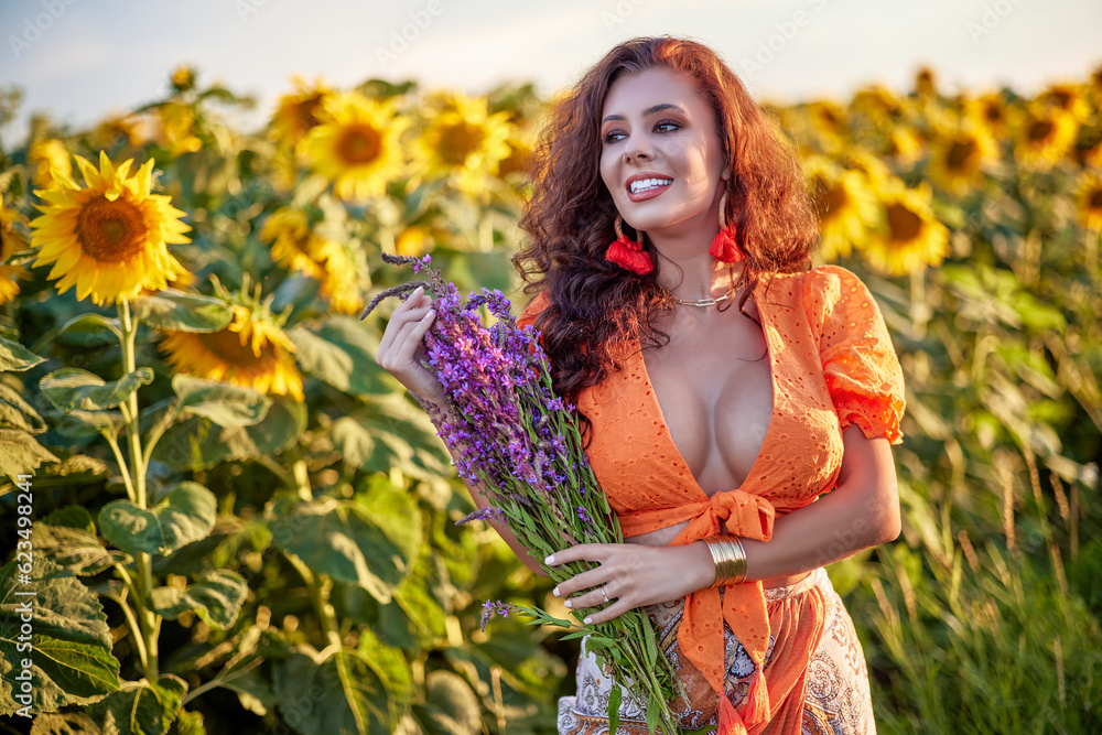 portrait of a beautiful woman near a field of sunflowers on a sunny day at sunset. portrait of a beautiful woman near a field of sunflowers on a sunny day at sunset.