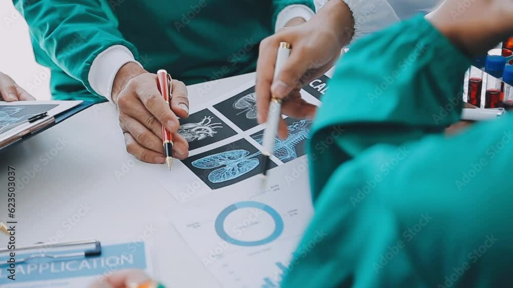 Cropped image of successful medical doctors discussing diagnosis during the conference Cropped image of successful medical doctors discussing diagnosis during the conference