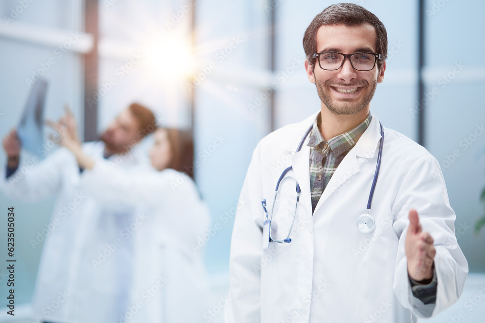 image of the doctor holding out his hand for greeting image of the doctor holding out his hand for greeting