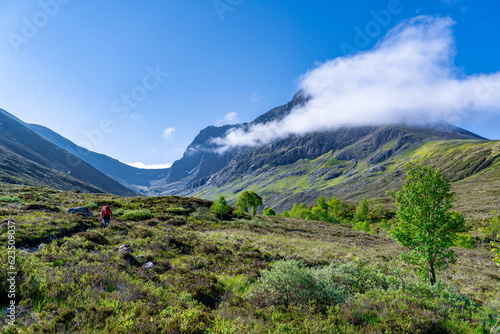 Hikers Walking Towards Ben Nevis in Scotland United Kingdom Hiking Via the North Face Route