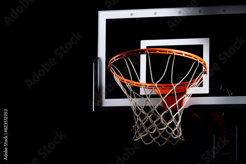 Basketball hoop on a black background.