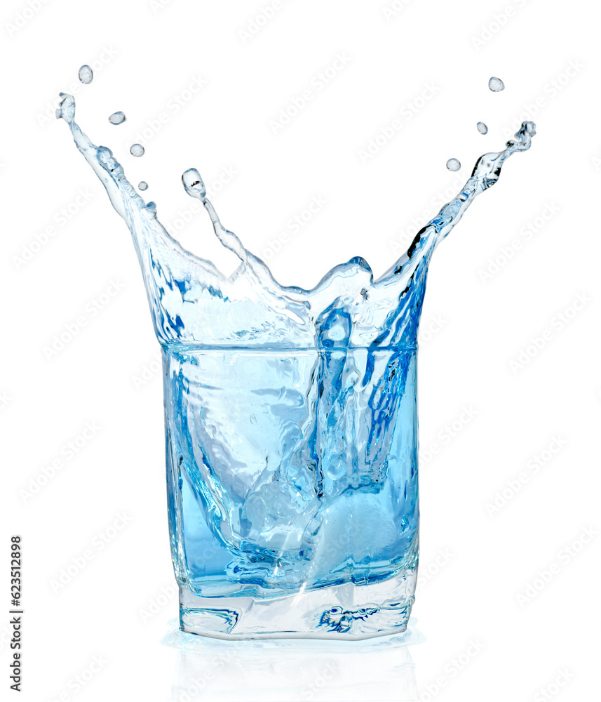 Ice cubes splashing into glass of water, isolated on white background Ice cubes splashing into glass of water, isolated on white background
