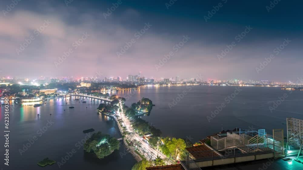 Aerial view of Hanoi skyline cityscape near Thanh Nien street and Tran Quoc pagoda at night. Famous destination of Vietnam Aerial view of Hanoi skyline cityscape near Thanh Nien street and Tran Quoc pagoda at night. Famous destination of Vietnam