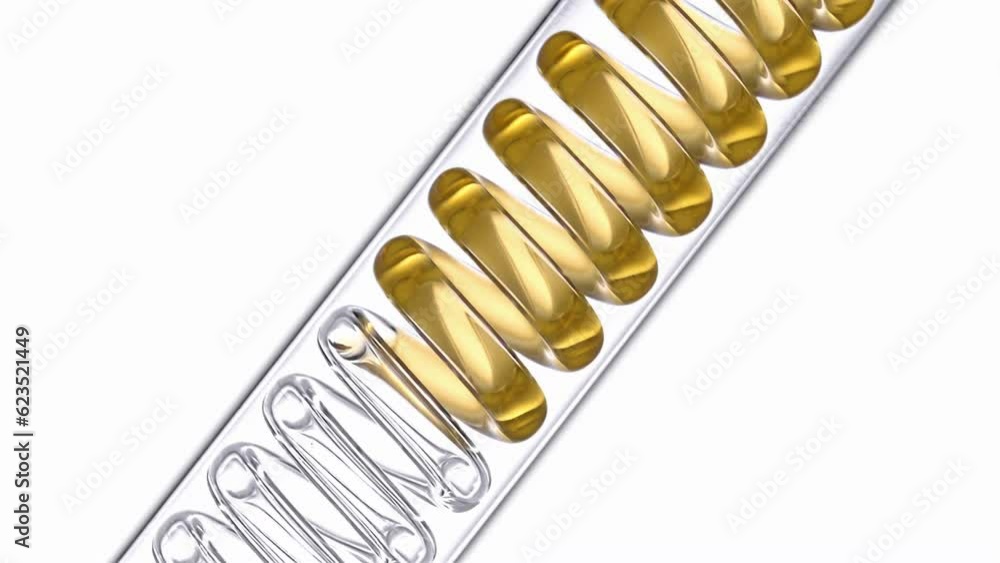 Yellow oil flows in a spiral.Getting natural oil from natural substances concept. Yellow oil flows in a spiral.Getting natural oil from natural substances concept.