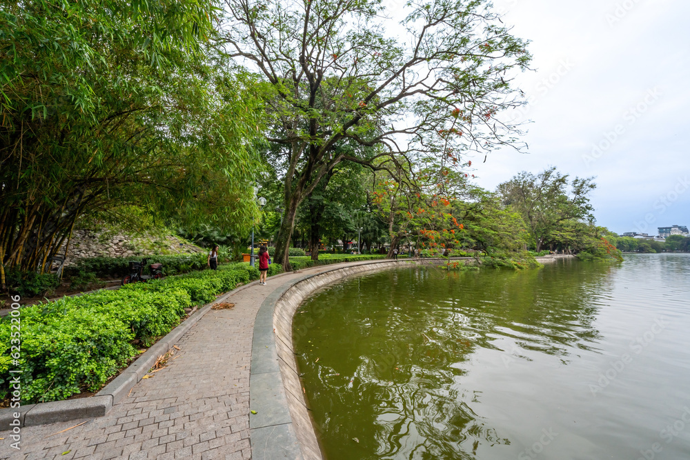 view of The Huc Red Bridge and Ngoc Son temple in the center of Hoan Kiem Lake, Ha Noi, Vietnam.