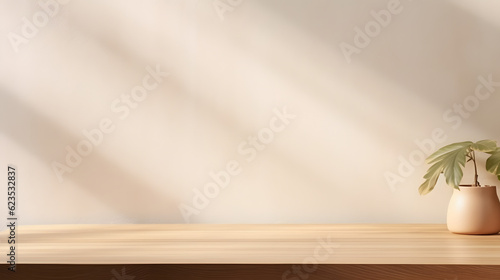 Fototapeta Naklejka Na Ścianę i Meble -  Blank brown wooden counter table in soft sunlight, leaf shadow on beige texture wallpaper wall for luxury organic cosmetic, skincare, beauty, body care, treatment product display background 3D