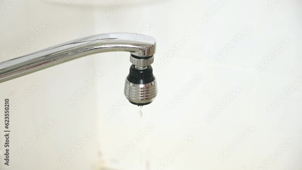 Running and dripping water. Turning off the water. Water tap , faucet. Flow water in bathroom with sink. Hygiene concept. Running and dripping water. Turning off the water. Water tap , faucet. Flow water in bathroom with sink. Hygiene concept.