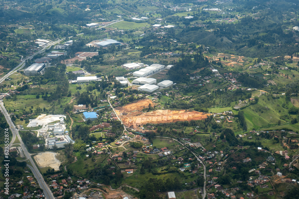 Aerial View of Rionegro Mountains, Hills, Trees, Farms, Houses and Small Facilities in the Countryside near Medellin, Antioquia, Colombia