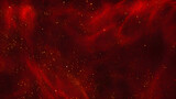 Red liquid with tints of golden glitters. Red background with a scattering of gold sparkles. Magic Galaxy of golden dust particles in red fluid with burgundy tints.