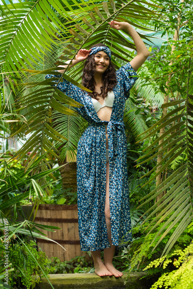 Pretty woman in jungle rain forest in tropic Pretty woman in jungle rain forest in tropic