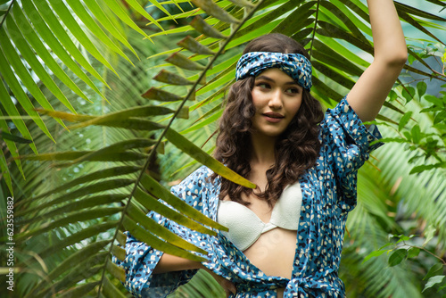Pretty woman in jungle rain forest in tropic