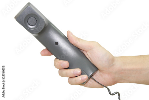 Hand holding telephone receiver isolated with clipping path
