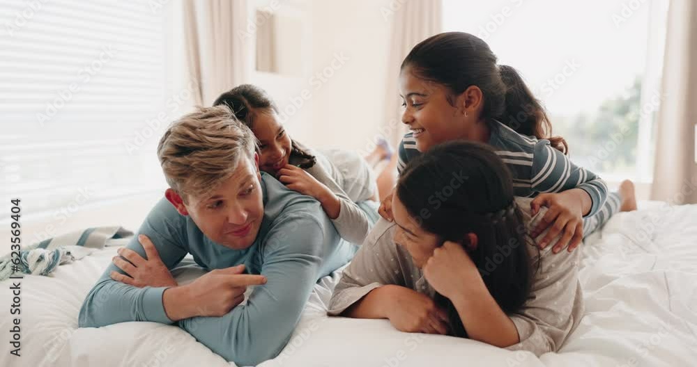 Parents, bed and happy family in conversation in a bedroom or mother and father as bonding with children together. Happiness, love and kid talking with mom and dad in the morning at home for care Parents, bed and happy family in conversation in a bedroom or mother and father as bonding with children together. Happiness, love and kid talking with mom and dad in the morning at home for care