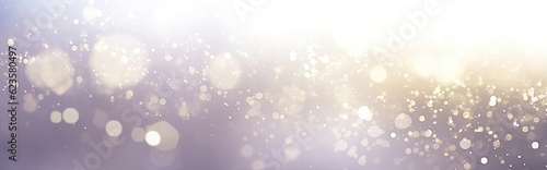 Defocused background of glittering antique lights in colors including silver, gold, pink, and white.