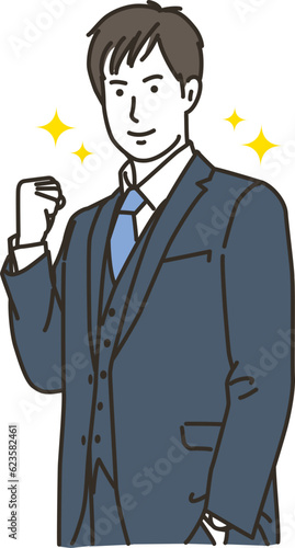 ガッツポーズをする男性のビジネスパーソン