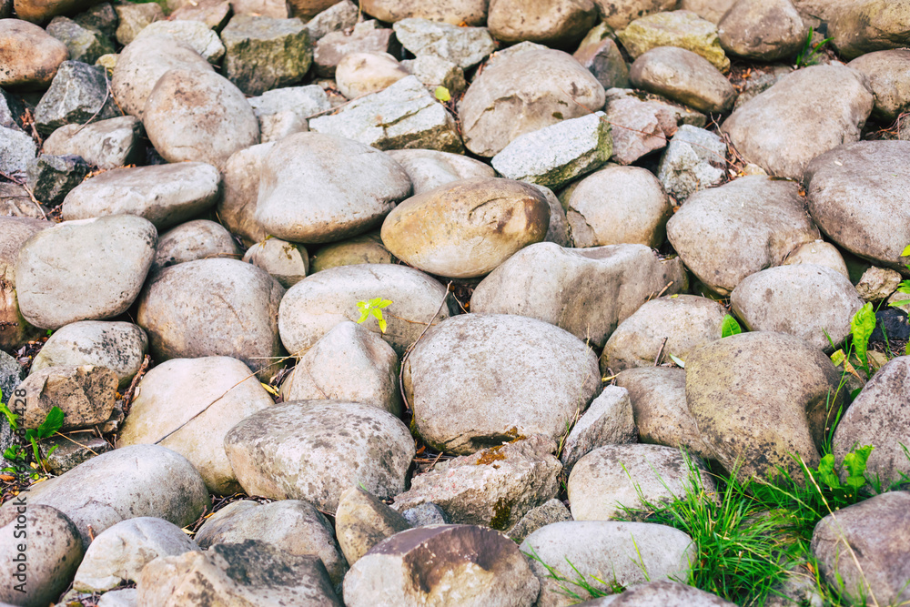 Close up photo of gray stones on the river beach Close up photo of gray stones on the river beach